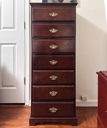 A Classic Cherry Wood Lingerie Chest With Brass Hardware