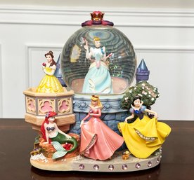 A Disney Princess Snow Globe And Music Box