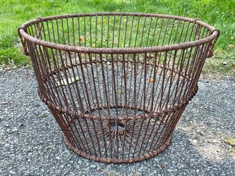 A Large Rustic Wire Basket