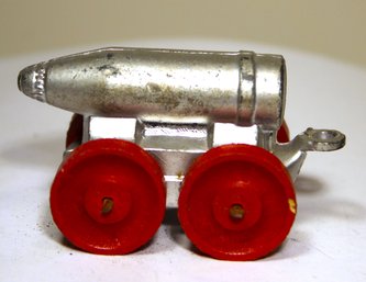 Vintage Dome Store Lead Soldier Bomb On Wood Wheels