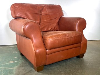 A Leather Rolled Arm Chair By Pottery Barn