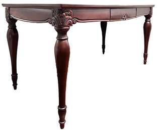 An Indonesian Desk In Carved Mahogany