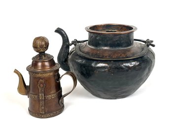 A Pairing Of Antique Primitive Lidded Tea Or Coffee Pots, Bronze And Copper