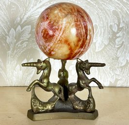 An Onyx Globe On Brass Unicorn Stand