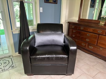 A Dark Brown Faux Leather Accent Chair