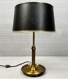 A Vintage Brass Table Lamp With Custom Metallic Lined Shade