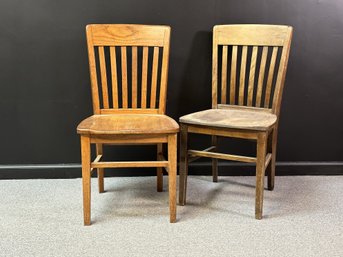 A Pair Of Vintage Oak Chairs