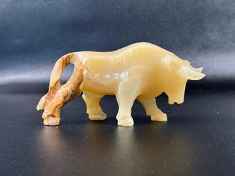 A Bull Figurine In Marbled Onyx