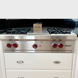 A Wolf 36' Four Burner Cook Top With Griddle - Kitchen