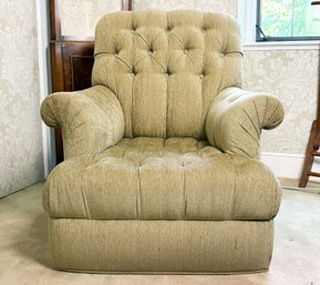 A Fine Quality Tufted And Rolled Arm Chair