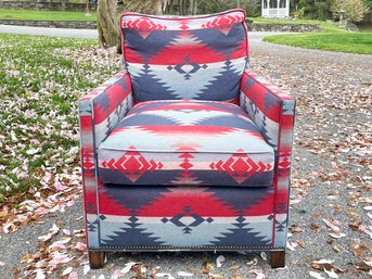 A Southwestern Inspired Modern Arm Chair With Down Stuffing And Nailhead Trim By Vanguard Furniture