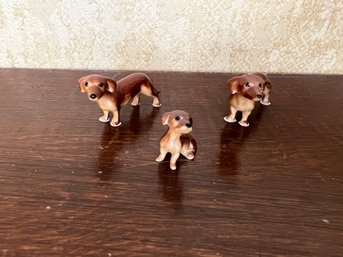 Three Miniature Dachshund Ceramic Figurines