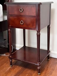 An Elegant Cherry Wood Nightstand, Brass Hardware And Feet