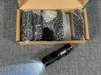 A Set Of Six Mini LED Flashlights, New-In-Package