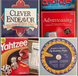 Library Of Games Including Trivial Pursuit, Monopoly, And Yahtzee