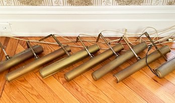 An Assortment Of Brass Art Lights