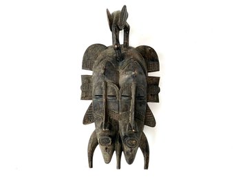 An Antique Carved Hard Wood African Mask