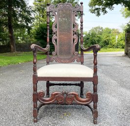 An Antique Carved Wood Arm Chair In Hacienda Style