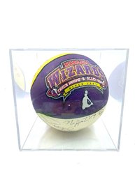 Signed Harlem Wizards Basketball In Acrylic Display Case