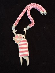 Pink Resin And Silver Man Pendant Necklace