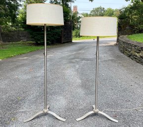 A Pair Of Chrome Standing Lamps