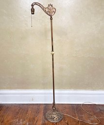 An Antique Bronze Standing Lamp