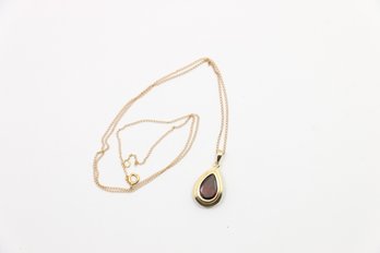 14k Yellow Gold Garnet Pendant With 10k Gold Necklace