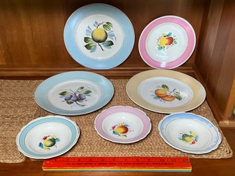 Colorful Rim And Fruit Motif Porcelain Plates And Bowls No Chips Shows Wear