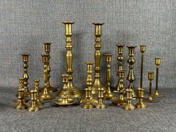 A Fantastic Assortment Of Vintage Candlesticks In Brass