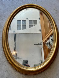 A Wood Gilt Oval Mirror