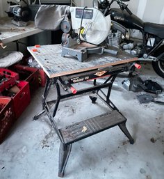 A Craftsman Compound Miter Saw And Adjustable Workbench