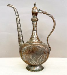 A Moroccan Copper Coffee Pot