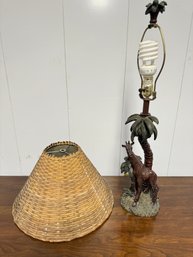 A Cast Resin Safari Motif Table Lamp