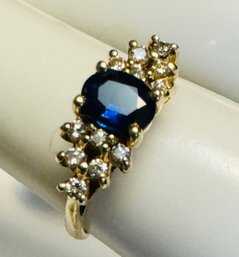 PRETTY 14K GOLD BLUE TOPAZ AND DIAMOND RING