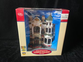 LEMAX Lighted Building Facades Evergreen Drug Store Collectible