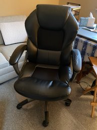 Black Faux Leather Office Chair. Swivels And Leans