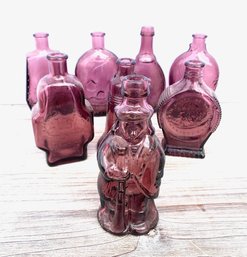 Collection Of 8 Amethyst Glass Bottles