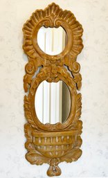 A Carved Wood Framed Mirror