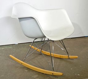 A Modern Molded Plastic Rocking Chair