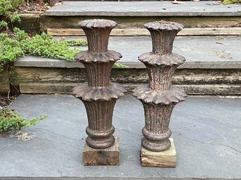 A Pair Of Antique Iron Finials On Wooden Base