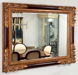 A Large Beveled Mirror In Ornate Parcel-Gilt Frame