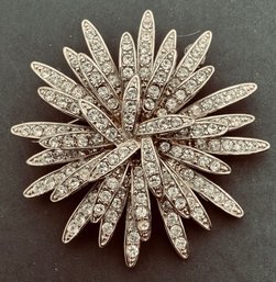 PRETTY SILVER TONE RHINESTONE STARBURST BROOCH