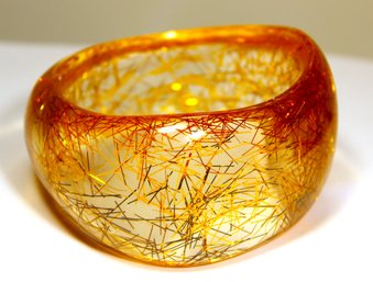 Large Vintage Wide Gold Flake Amber Colored Acrylic Lucite Plastic Bangle Bracelet