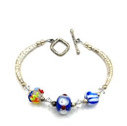 Lovely Sterling Silver Painted Charms And Beveled Style Bracelet