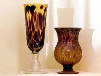 A Pair Of Large Glass Vessels