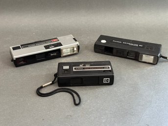 Three Vintage Pocket Cameras By Kodak & Berkey
