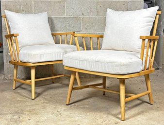 A Pair Of Modern Oak Arm Chairs With Linen Cushions