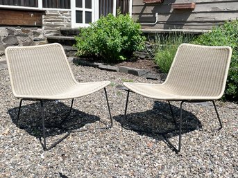 A Pair Of Modern Woven And Wrought Iron Outdoor Chairs By West Elm