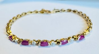 GORGEOUS GOLD OVER STERLING SILVER RUBY AND DIAMOND BRACELET