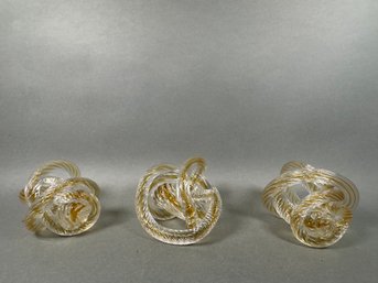 Three Fusion Z Signed Amber Glass Knot Figures